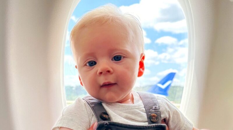 Chaplin looking out the window before the flight